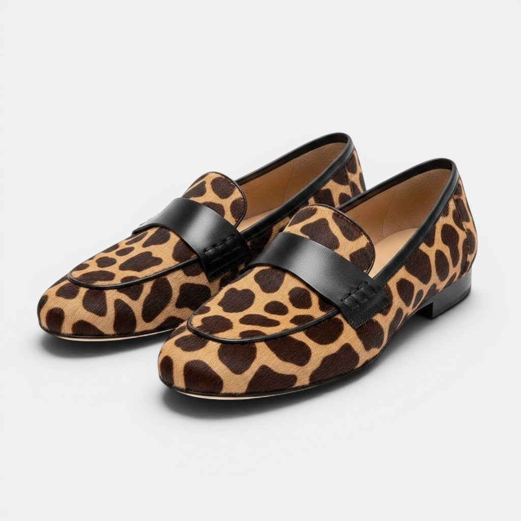 ZOFIA ATELIER women's tan and brown giraffe print calf hair loafers with black leather strap and trim.