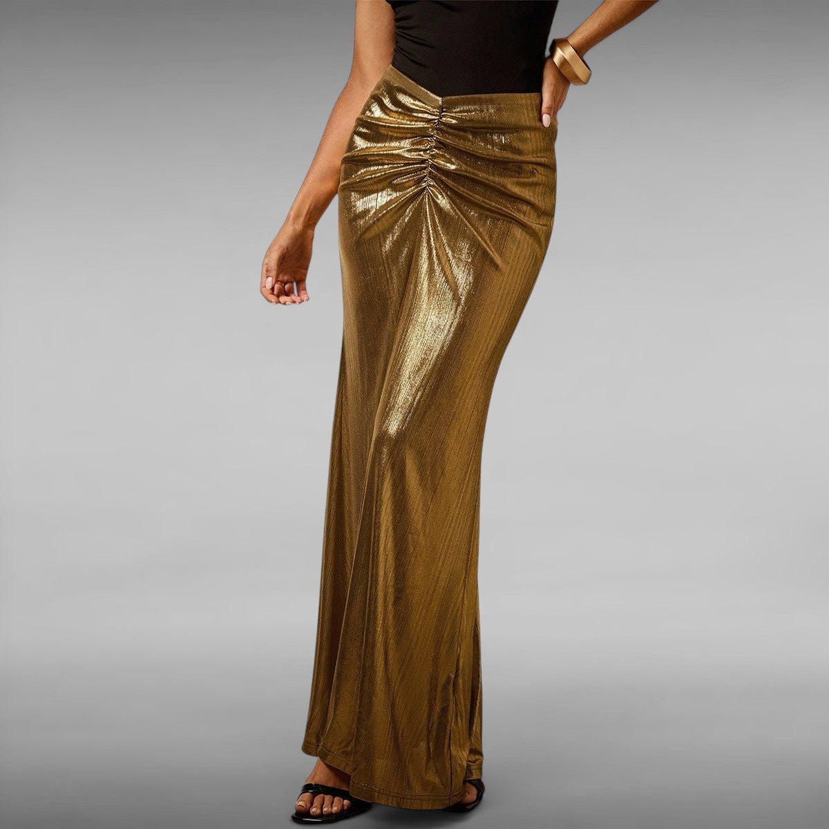 ZOFIA ATELIER gold pleated long skirt with ruched detail and moderate stretch, made of polyester fiber.