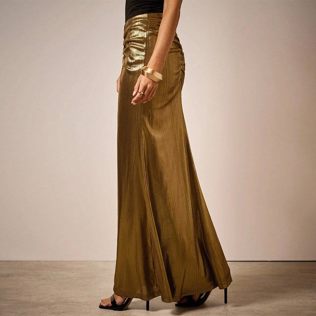 ZOFIA ATELIER gold pleated long skirt with ruched detail and subtle vertical stripes, made of polyester.