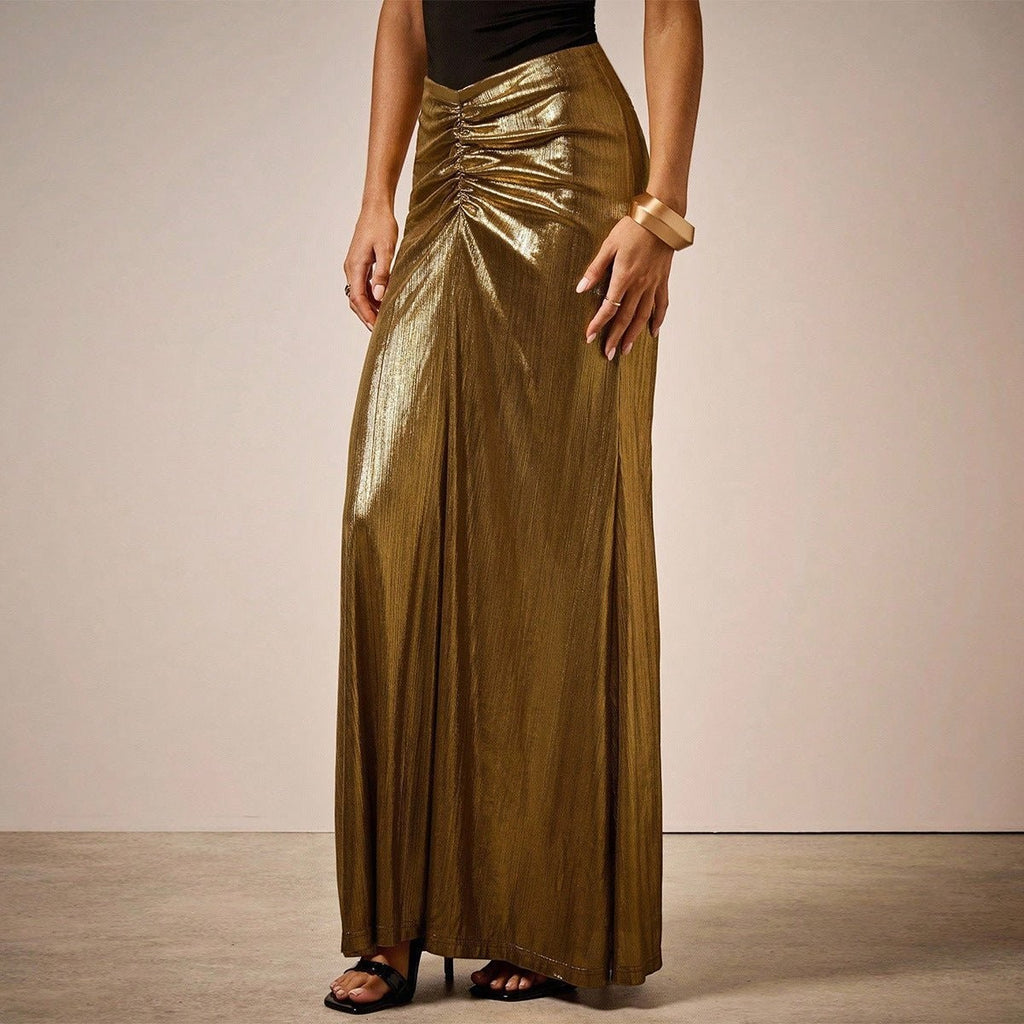 ZOFIA ATELIER gold pleated long skirt with ruched detail and side slit, made of polyester fiber.