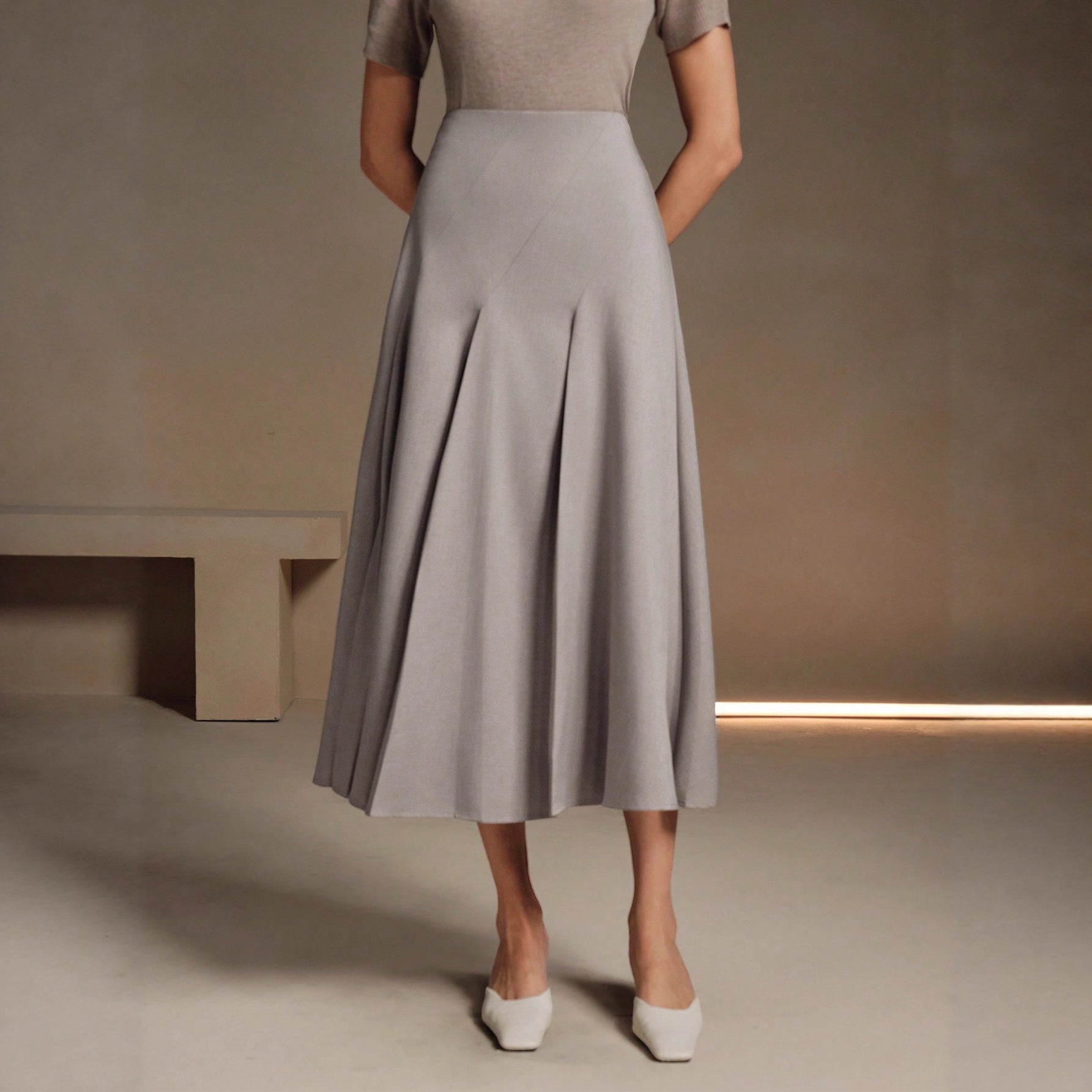 ZOFIA ATELIER gray polyester mid-length asymmetrical pleated skirt with a structured fit.