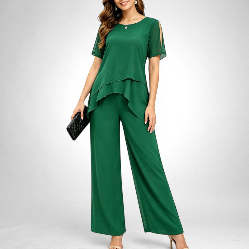 ZOFIA ATELIER Adelina green chiffon patchwork set with wide-leg pants and layered top with cold shoulders.