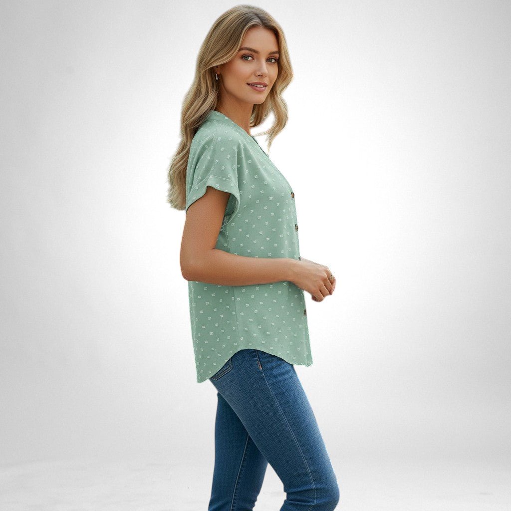 ZOFIA ATELIER light green jacquard V-neck short-sleeve blouse with button detail, worn by a model outdoors.