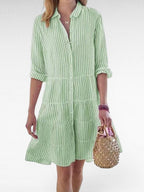 ZOFIA ATELIER green and white striped polyester shirt dress with lapel neckline and tiered skirt.