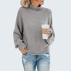 ZOFIA ATELIER Anna grey chunky knit turtleneck sweater with relaxed fit and ribbed cuffs and hem.