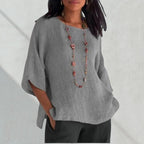 ZOFIA ATELIER grey linen-blend blouse with relaxed fit and statement necklace