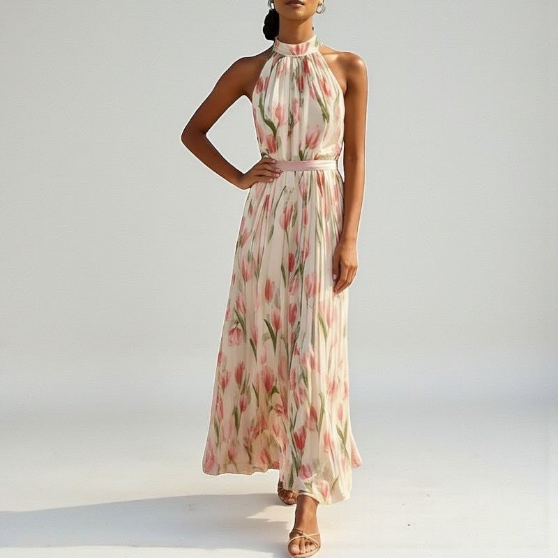ZOFIA ATELIER WIKTORIA halter swing maxi dress in cream with pink floral print, pleated skirt, and pink sash.