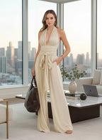 ZOFIA ATELIER cream polyester halter-neck sleeveless wide-leg jumpsuit with tie waist and deep V-neck.
