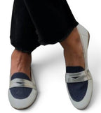 ZOFIA ATELIER Helena classic slip-on loafers in white and navy blue with silver accent. Round toe.