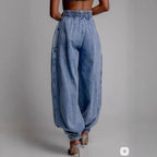ZOFIA ATELIER light blue denim high waist loose jeans with elastic waistband and ankle ties.