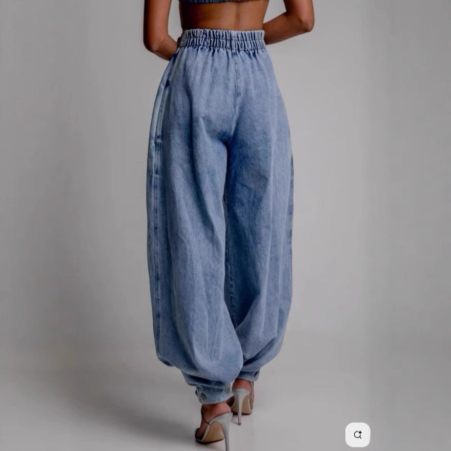 ZOFIA ATELIER light blue denim high waist loose jeans with elastic waistband and ankle ties.