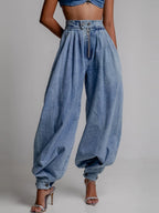 ZOFIA ATELIER light blue denim high waist loose jeans with zipper fly and ankle ties.