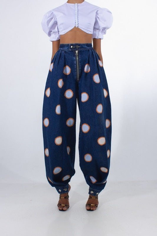 ZOFIA ATELIER high waist loose jeans in blue denim with white and orange polka dots, ankle ties.