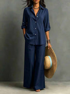 ZOFIA ATELIER INES navy blue cotton resort set with full-length pants and regular sleeves.