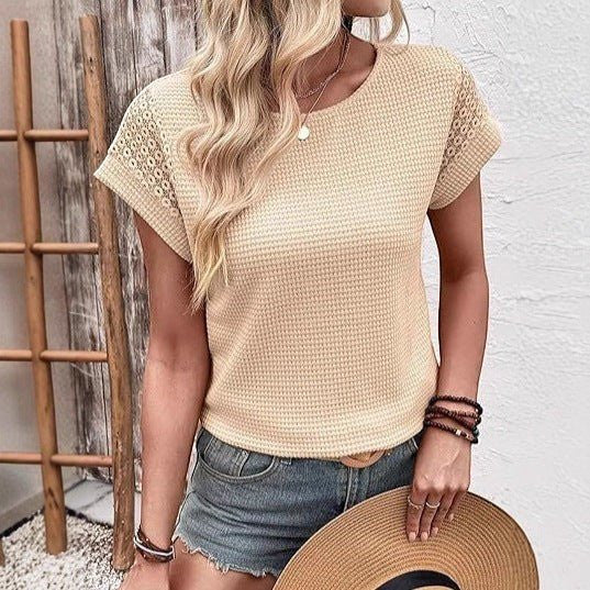 ZOFIA ATELIER Isa crew neck short sleeve blouse in beige waffle knit with lace detail on sleeves.