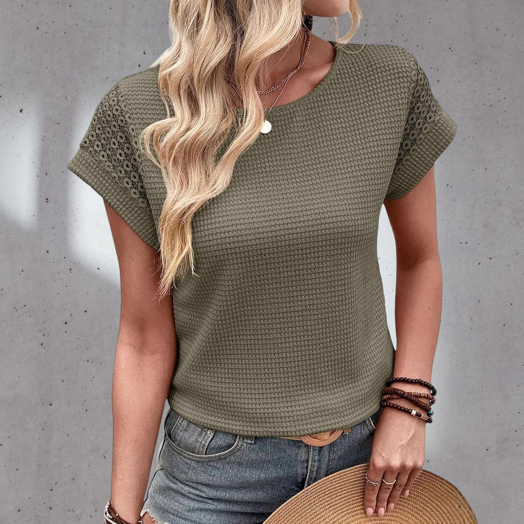 ZOFIA ATELIER Isa crew neck short sleeve blouse in olive green waffle knit with lace detail on sleeves.