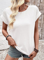 ZOFIA ATELIER Isa white waffle knit crew neck short sleeve blouse with eyelet detail on sleeves.