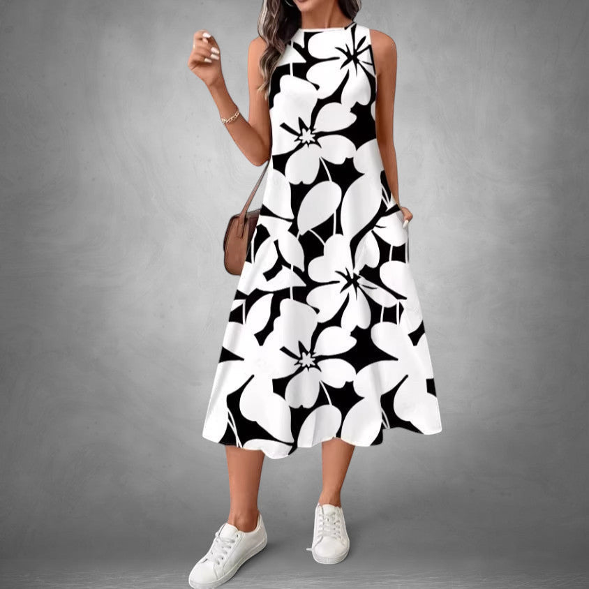 ZOFIA ATELIER Isabella sleeveless floral midi dress in black and white polyester with pockets.