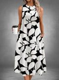 ZOFIA ATELIER Isabella sleeveless floral print midi dress in black and white polyester with pockets.