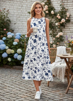 ZOFIA ATELIER Isabella sleeveless floral print polyester midi dress in white with navy blue pattern.