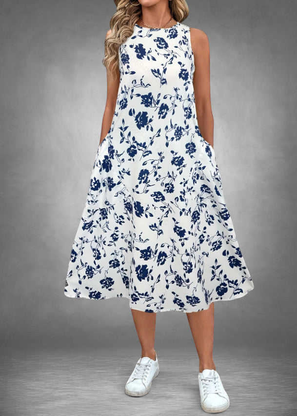 ZOFIA ATELIER Isabella sleeveless white polyester midi dress with navy floral print and pockets.