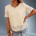 ZOFIA ATELIER Izabela embroidered t-shirt top in cream polyester with hollow-out floral details on sleeves and hem.