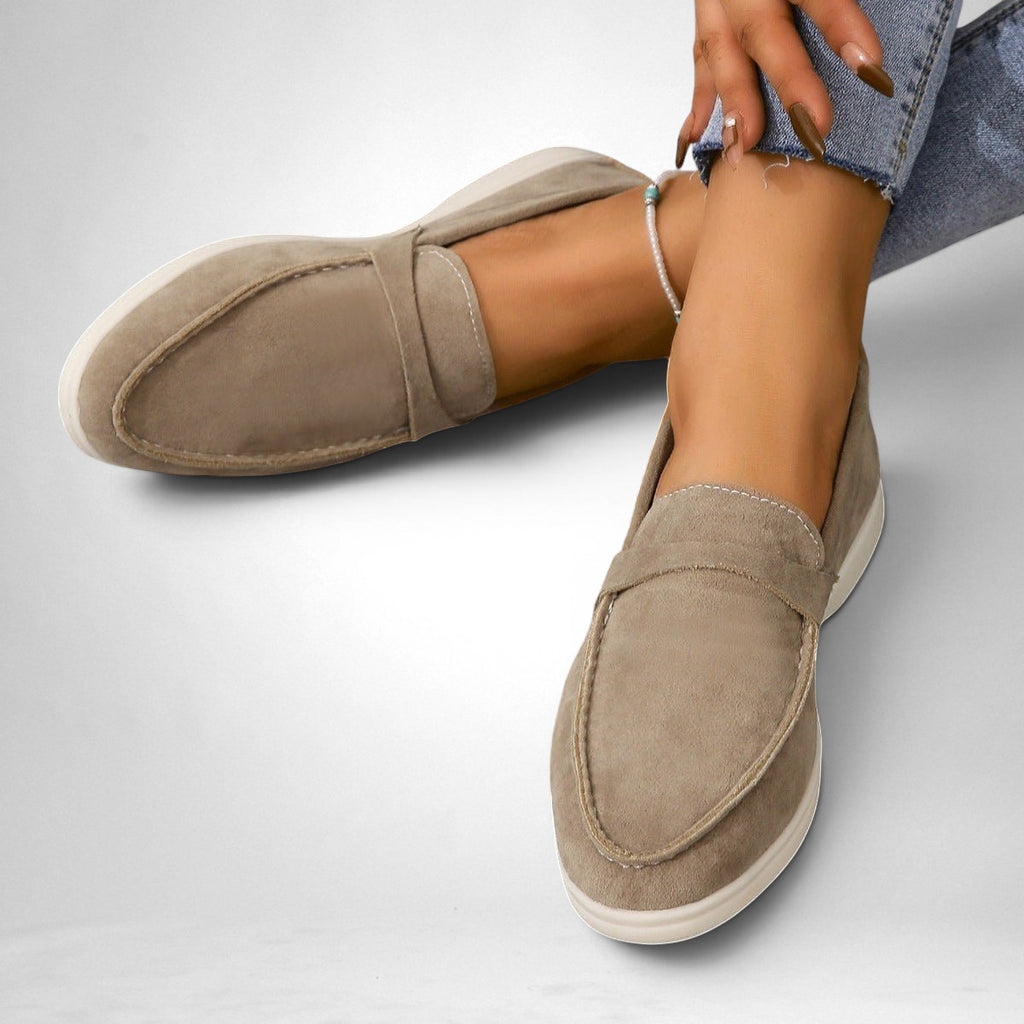 ZOFIA ATELIER Jadwiga taupe suede-style slip-on flats with a minimalist design and white sole.