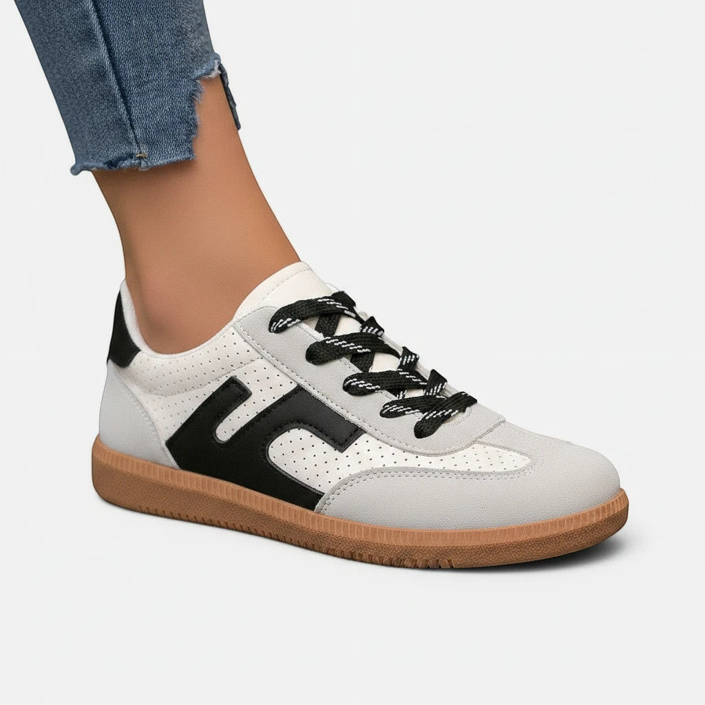 ZOFIA ATELIER JOANNA retro color-block sneakers in white, grey, and black PU with rubber sole.