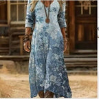 ZOFIA ATELIER JOLANTA watercolor boho maxi dress with blue floral print, V-neck, and long sleeves.