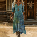 ZOFIA ATELIER Jolanata watercolor boho maxi dress with V-neck and long sleeves in blue and green hues.