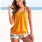 ZOFIA ATELIER Karina Curve Split Bikini Set in mustard yellow with tropical leaf print shorts. Tankini style top with gathered detail.