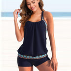 ZOFIA ATELIER Karina Curve Split Bikini Set in navy blue with a patterned trim. Tankini top and shorts.