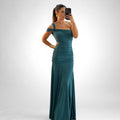 ZOFIA ATELIER Karolina slim fit teal polyester maxi dress with oblique shoulder and ruched waist.