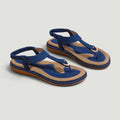 ZOFIA ATELIER Kasia royal blue PU flip-flops with elastic ankle strap and gold buckle detail.
