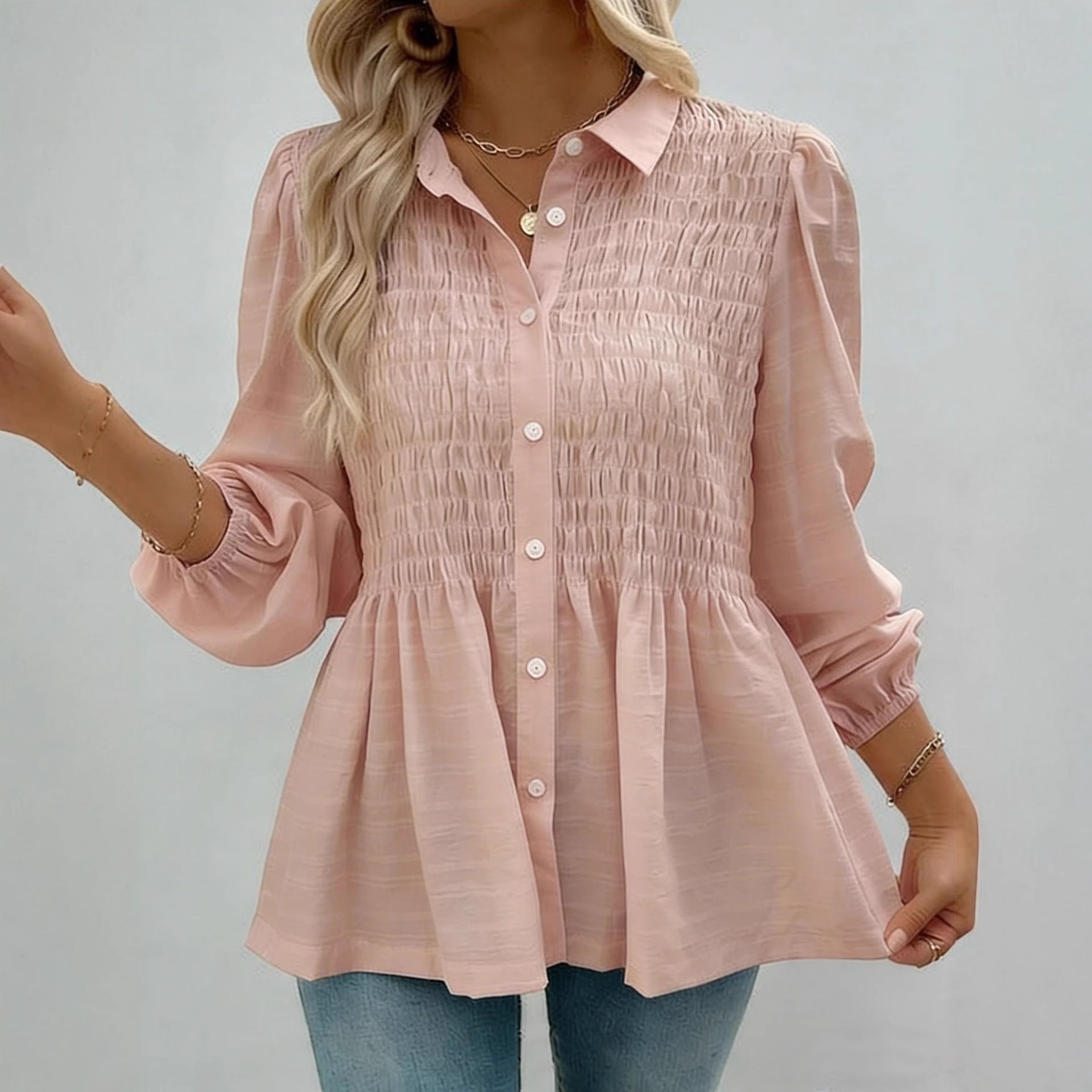 ZOFIA ATELIER KATARZYNA pink polyester button-down shirt with smocked bodice and puff sleeves.