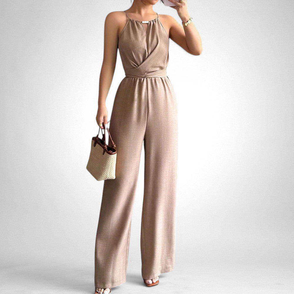 ZOFIA ATELIER khaki polyester sleeveless halter neck jumpsuit with cinched waist and wide legs.
