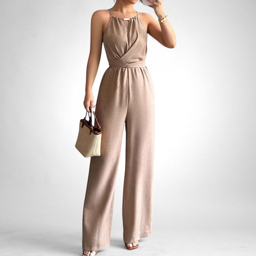 ZOFIA ATELIER khaki polyester sleeveless halter neck jumpsuit with cinched waist and wide legs.
