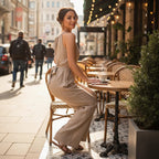 ZOFIA ATELIER khaki polyester cinched waist halter neck sleeveless jumpsuit with tie-back detail.