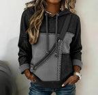 ZOFIA ATELIER Klara hooded top in grey and black polyester with a 3D effect print and diagonal zipper detail.