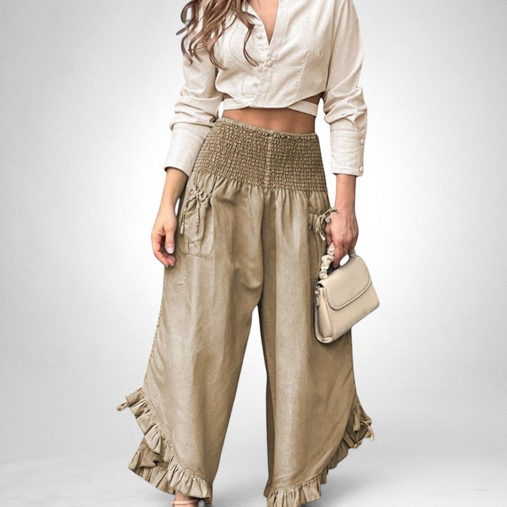 ZOFIA ATELIER beige polyester cropped pants and long sleeve top set with ruffled hems and smocked waist.