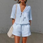 ZOFIA ATELIER light blue short-sleeve lace-up top and shorts set made of polyester-ammonia blend.