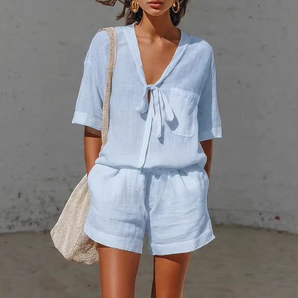 ZOFIA ATELIER light blue short-sleeve lace-up top and shorts set made of polyester-ammonia blend.