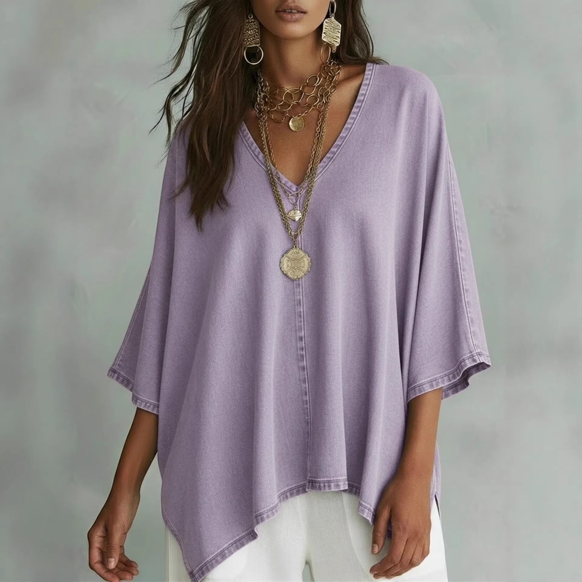 ZOFIA ATELIER relaxed fit V-neck batwing sleeve tunic blouse in washed-out lavender polyester.