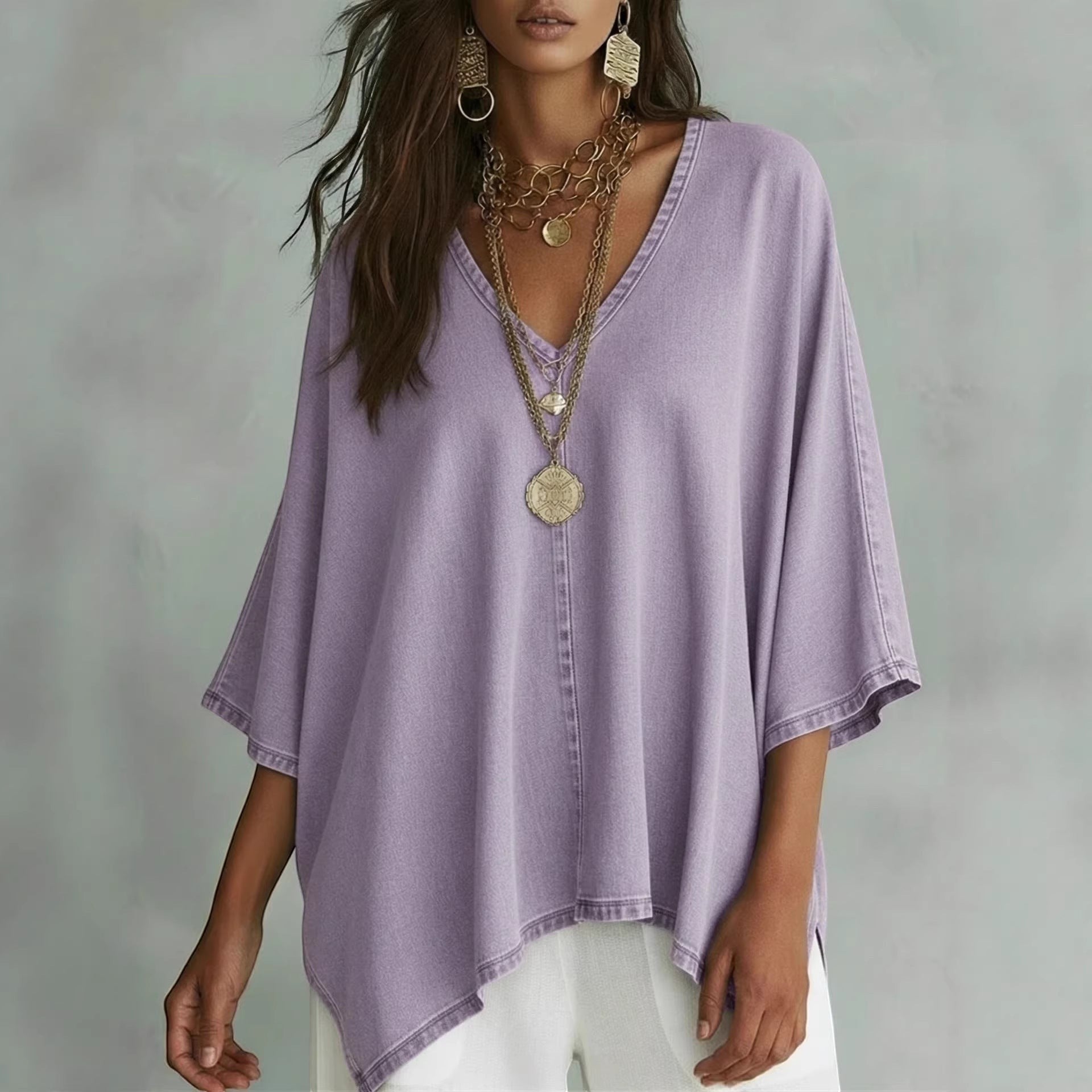 ZOFIA ATELIER relaxed fit V-neck batwing sleeve tunic blouse in washed-out lavender polyester.