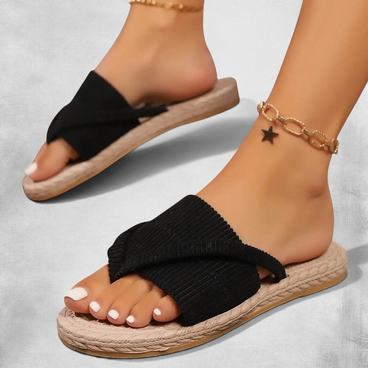 ZOFIA ATELIER Lena black ribbed orthopedic sandals with cross-strap design and braided sole.