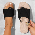 ZOFIA ATELIER LENA black ribbed cross-strap orthopedic sandals with beige sole.