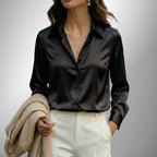 ZOFIA ATELIER LENA black satin long sleeve blouse with lapel neckline and button-down front.