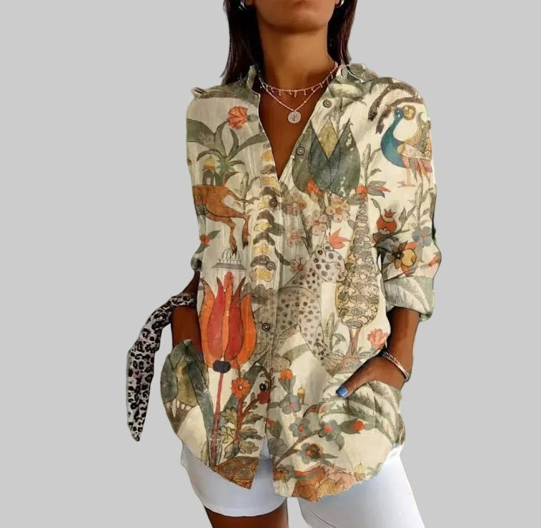 ZOFIA ATELIER Lena button-up blouse with a vibrant artistic print of animals and flowers, relaxed fit, long sleeves.