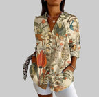 ZOFIA ATELIER Lena button-up blouse with a vibrant artistic print of animals and flowers, relaxed fit, long sleeves.