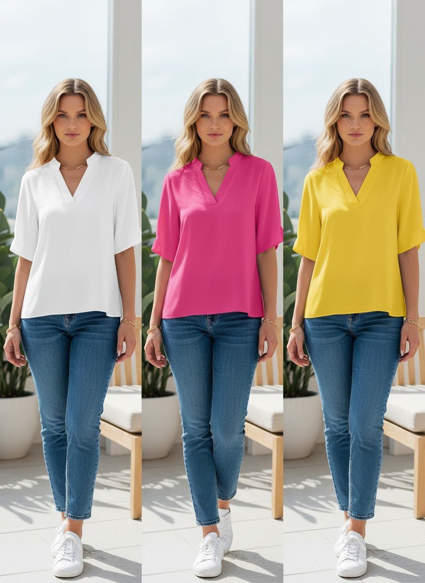ZOFIA ATELIER LENA notch neck summer blouse in white, pink, and yellow. Lightweight, flowing fabric with split sleeves.